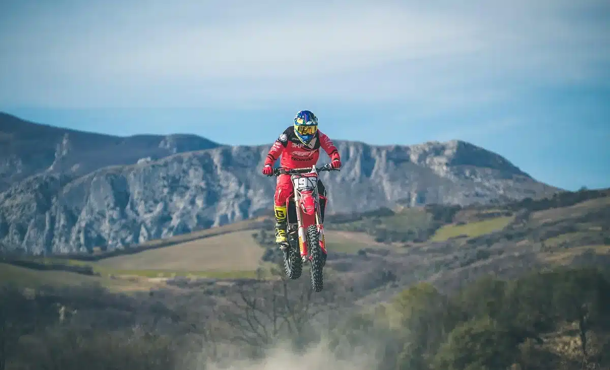 Motocross outdoor track with start gate and riders preparing