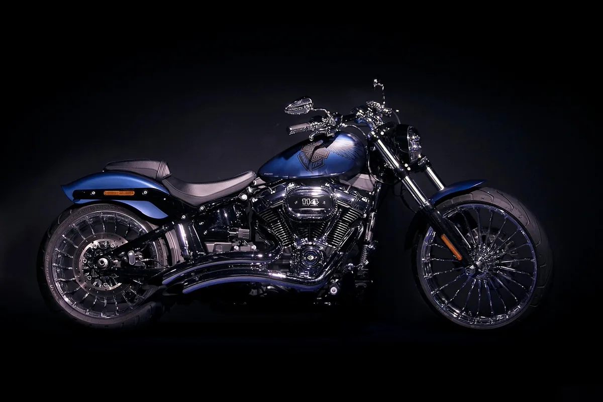 Crowd around custom bagger at a motorcycle event