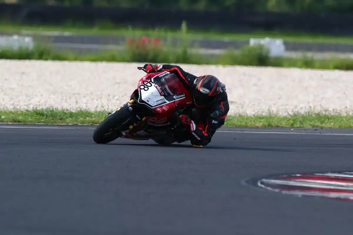Two generic superbikes battling closely on track during a race