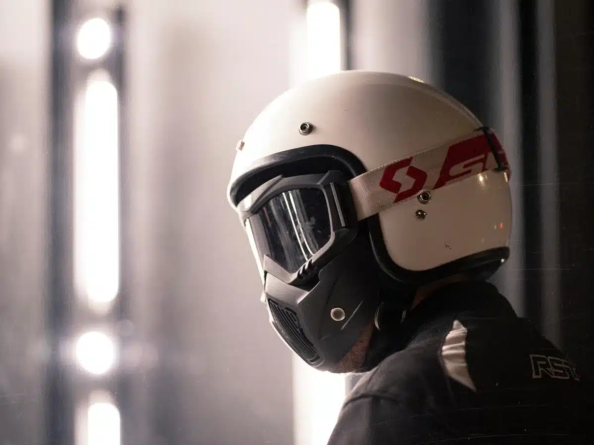 Motorcycle gear and protective equipment neatly arranged with a checklist