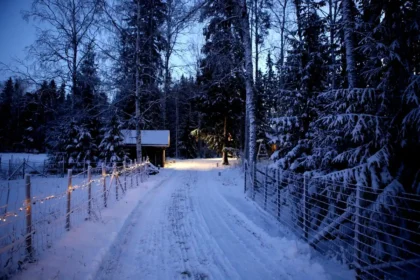 Anonymous pit lane with spare tires and equipment in winter paddock
