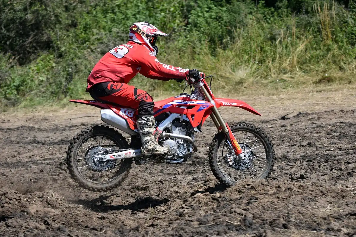 Unbranded budget dual-sport motorcycle parked on gravel
