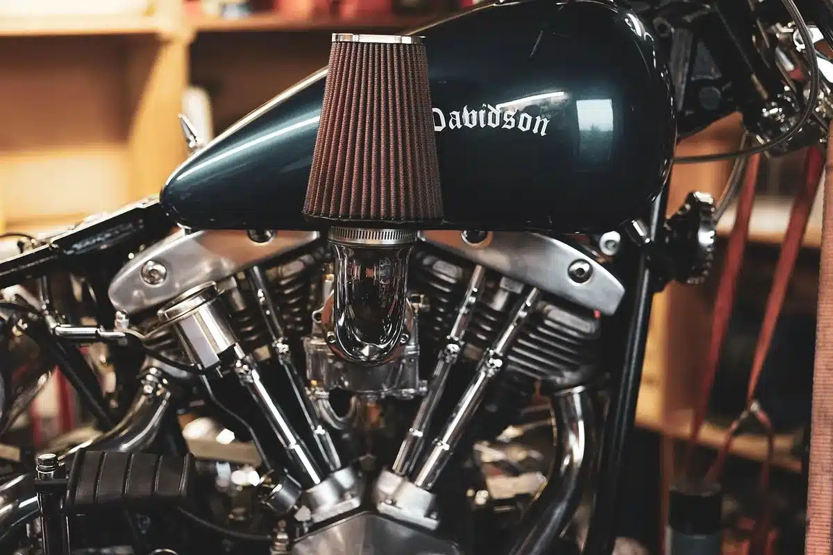 Close-up of a mid-size motorcycle engine and exhaust