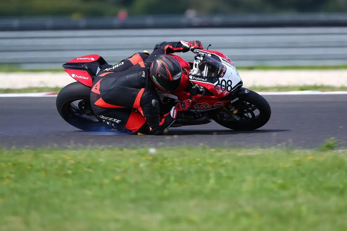 Honda RC213V-style motorcycle on the track during a race