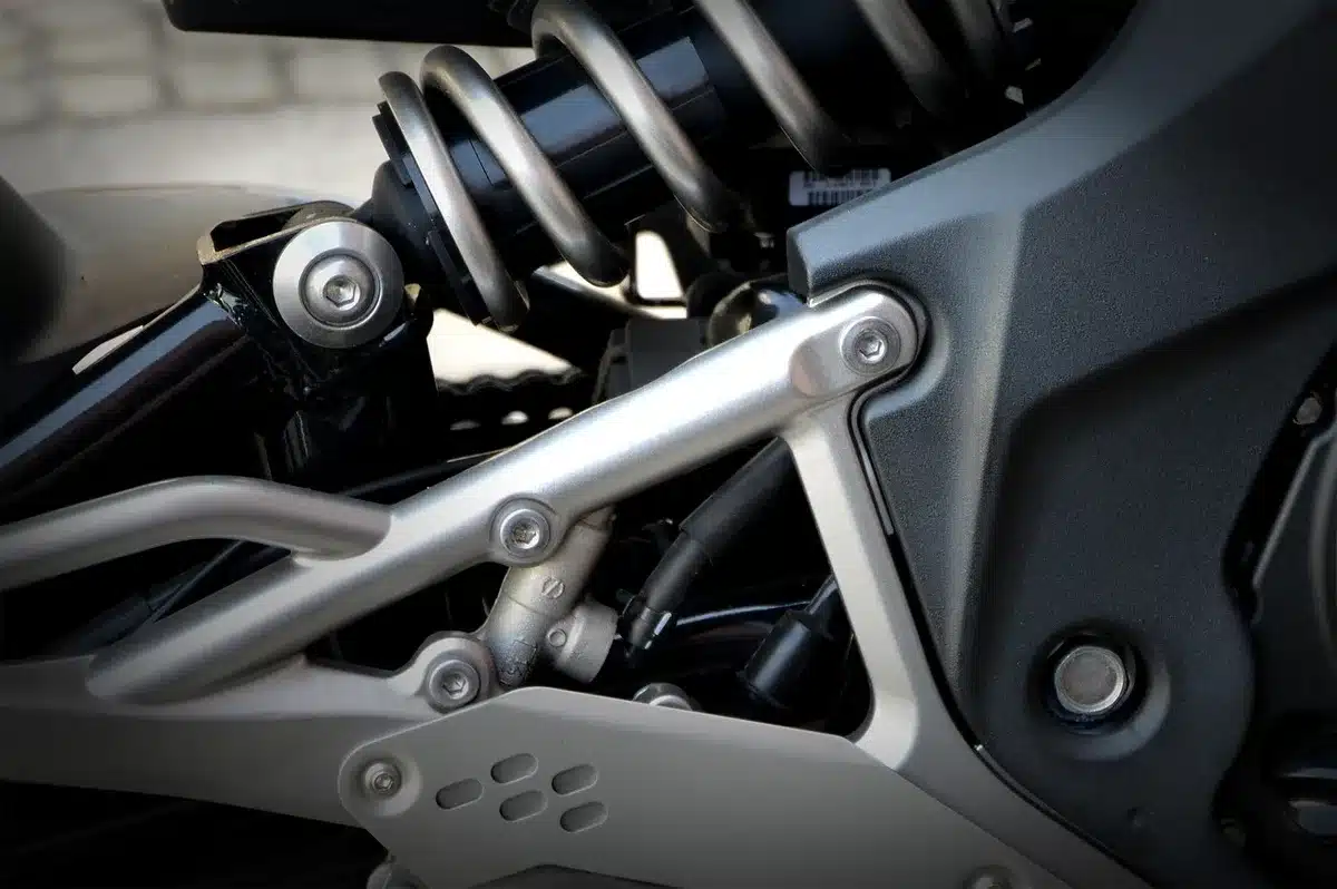 Adjustable front forks and full-floater rear shock on an adventure bike