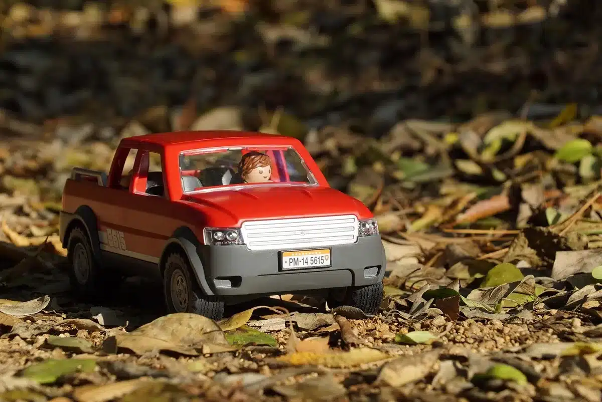 Close view of small off‑road wheels negotiating rocky trail